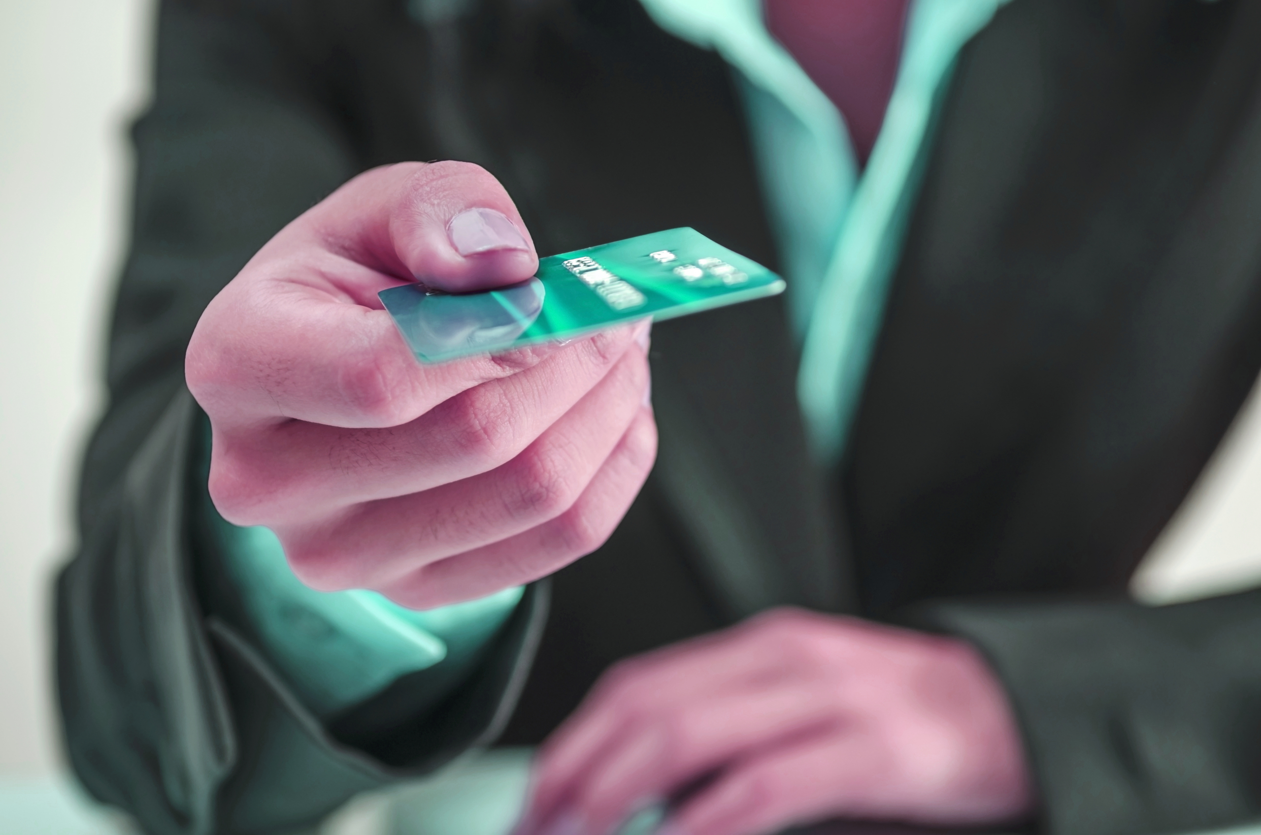 Bank office worker providing credit card